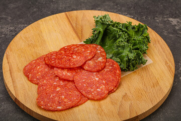 Italian spycy pepperoni sausage slices