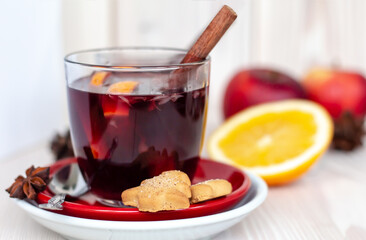 side view of traditional winter hot alcohol cocktail in transparent glass, christmas homemade...