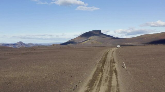 Off-road Car Driving In Dirt Road Towards Helka Volcano In South Iceland. - aerial tracking