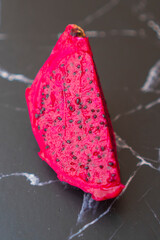 dragon fruit on black background