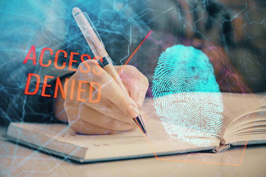 Blue fingerprint hologram over woman's hands taking notes background. Concept of protection. Double exposure