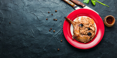 Delicious risotto with rabbit. © nikolaydonetsk