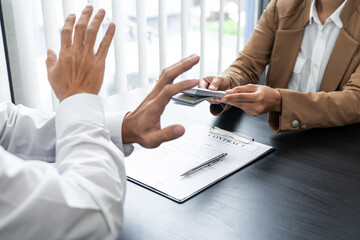 Businessman partner hand gesture rejecting refusing money, anticorruption concept.