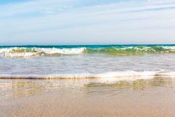 Bursts of sea waves on a tropical sea beach,