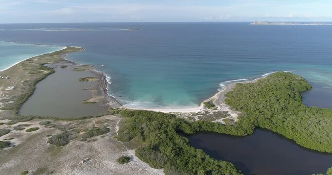 Aerial View Of Remote Lagoon And Mangrove In The  Los Roques venezuela CRASKY,  pan rigth  movement.