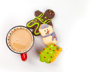 Christmas composition. mug with cocoa, gingerbread cookies and decorations on a white background. Christmas, winter, new year concept. Flat lay, top view, copy space