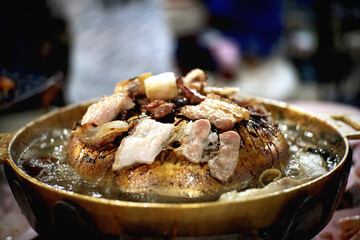 Pork is grilled in the restaurant