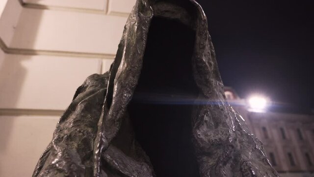 Statue Cloak of Conscience at night,Commendatore,Prague Estates Theatre,Czechia.