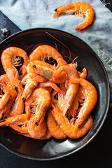 shrimp prawn seafood ready to eat cooked serving on a plate snack top view copy space for text food background rustic