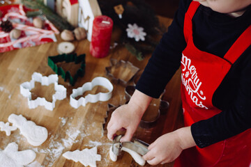 Cooking Christmas baking in an apron.
