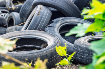 A bunch of old tires from used cars.