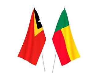National fabric flags of Benin and East Timor isolated on white background. 3d rendering illustration.