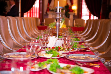 large wedding reception table with candles