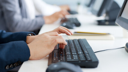 Closeup business people hands typing on keyboard computer desktop for using internet, searching data, working, writing email. - obrazy, fototapety, plakaty