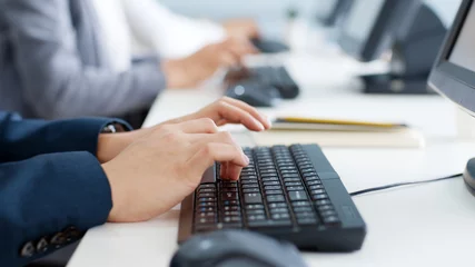 Fotobehang Closeup business people hands typing on keyboard computer desktop for using internet, searching data, working, writing email. © Nattakorn