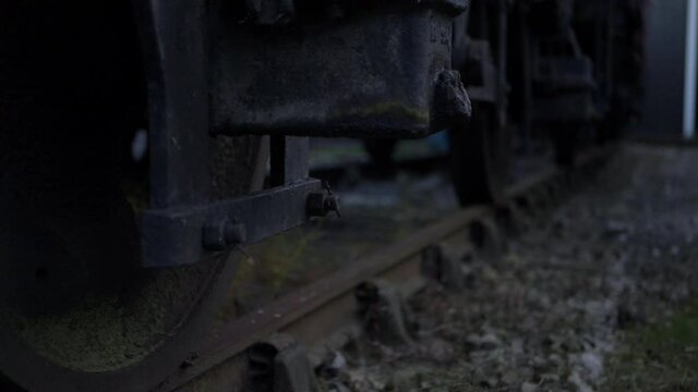 Train wheel on the track close up low zoom shot