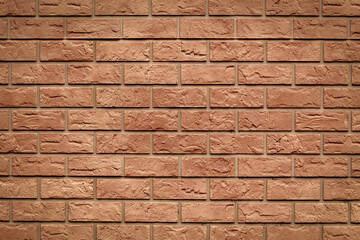 Brick texture. Orange background. Brown wallpaper for designer. Rectangular photo, image with easy vignetting.