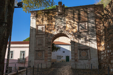 Fototapeta na wymiar Arco do Castelo, the main entrance to St George's Castle (Castelo de São Jorge), Alfama, Lisbon, Portugal