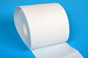 One roll of toilet paper on a blue background