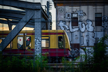 train passing by in urban surrounding in the city 