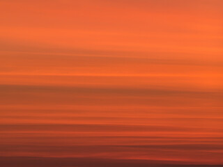 Long exposure picture with the orange sky at sunset.