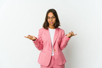 Young latin business woman isolated on white background crying, unhappy with something, agony and confusion concept.