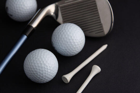 golf ball and iron stick
