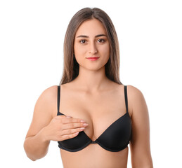Young woman in bra on white background