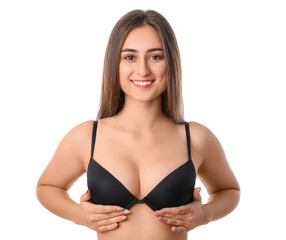 Young woman in bra on white background