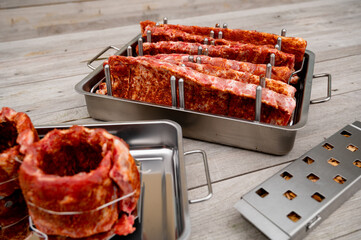 Tasty spiced and rubbed raw Spareribs waiting for the barbecue