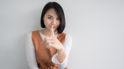 Fototapeta premium portrait of attractive woman in white background showing emotion or mood on face and acting with body language. 
