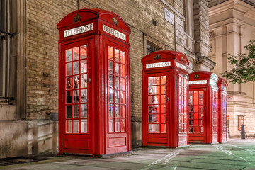 Famous red telephone booths in the evening, Covent Garden street, London, England