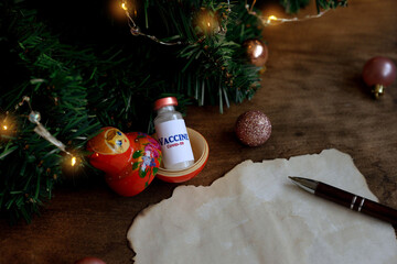 inside the nesting doll is a cure for the coronavirus. wish sheet with the numbers 2021. dear Santa...