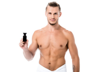  shirtless man in towel with perfume isolated on white
