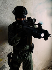 Man reenacting special unit of Croatian military police. Wearing green jumpsuit with black add-ons...