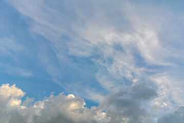 Obraz premium Air clouds in the blue sky.Blue backdrop in the air. Abstract style for text, design, fashion, agencies, websites, bloggers, publications, online marketers, brand, pattern, model, animation