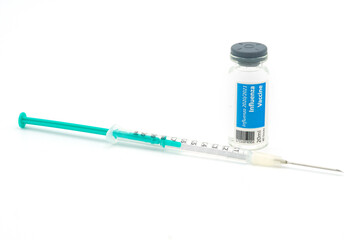 Influenza vaccination vial and a syringe with needle