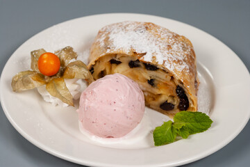 strudel with ice cream and mint leaf