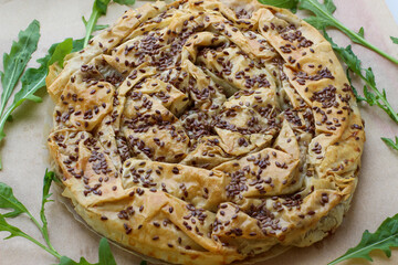 Delicious meat pie from puff pastry, which is traditionally prepared in the Balkans
