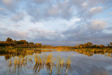 colorful evening sky over the river at sunset