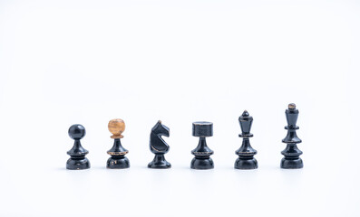 Old Chess Set - All Six black chess pieces on a white background with copy space