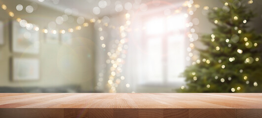 A wood table, tabletop product display with a festive living room Christmas background of Christmas...