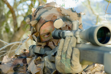 Soldier Aiming Through Gunsight