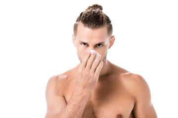 Fototapeta premium shirtless man using cotton pad isolated on white