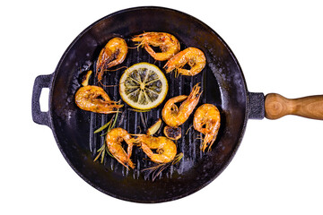 Roasted shrimps with lemon slice, garlic and rosemary in a cast iron pan isolated on white...