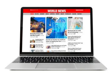 Sample news website shown on laptop computer