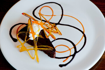 Chocolate cake with espresso ice cream. Classic American or French bakery favorite. Cookies, whipped cream, cakes, chocolate syrup butter, eggs and vanilla beans.