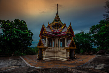 Fototapeta premium The background of a bridge or a walkway to admire the mountain scenery resembles a Phaya Naga mortgage statue, (Wat Phra Bat Phu Pan Kham) in Khon Kaen Province, Thailand.