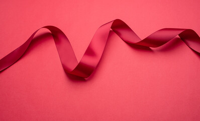 Festive red ribbon holiday poster background