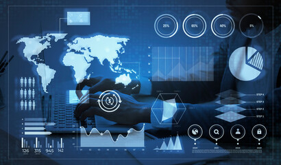 Global business analytics. Interactive screen with digital data layered over working businessman